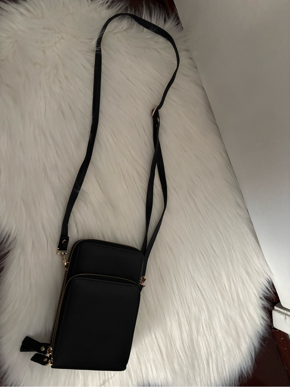 Minimalist Black Crossbody Phone Bag with Gold Accents